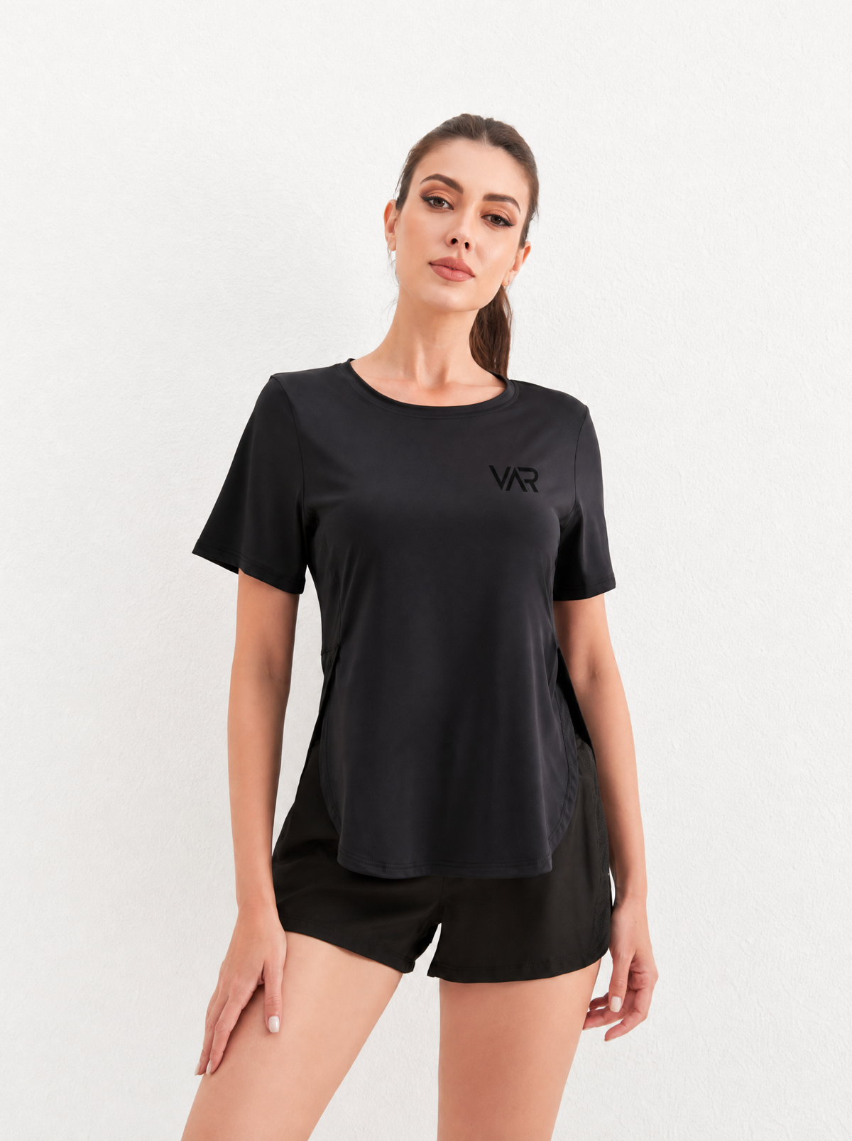 تيشيرت رياضي نسائي بقصة جانبية مفتوحة | Women's Side Slit Sports T-Shirt